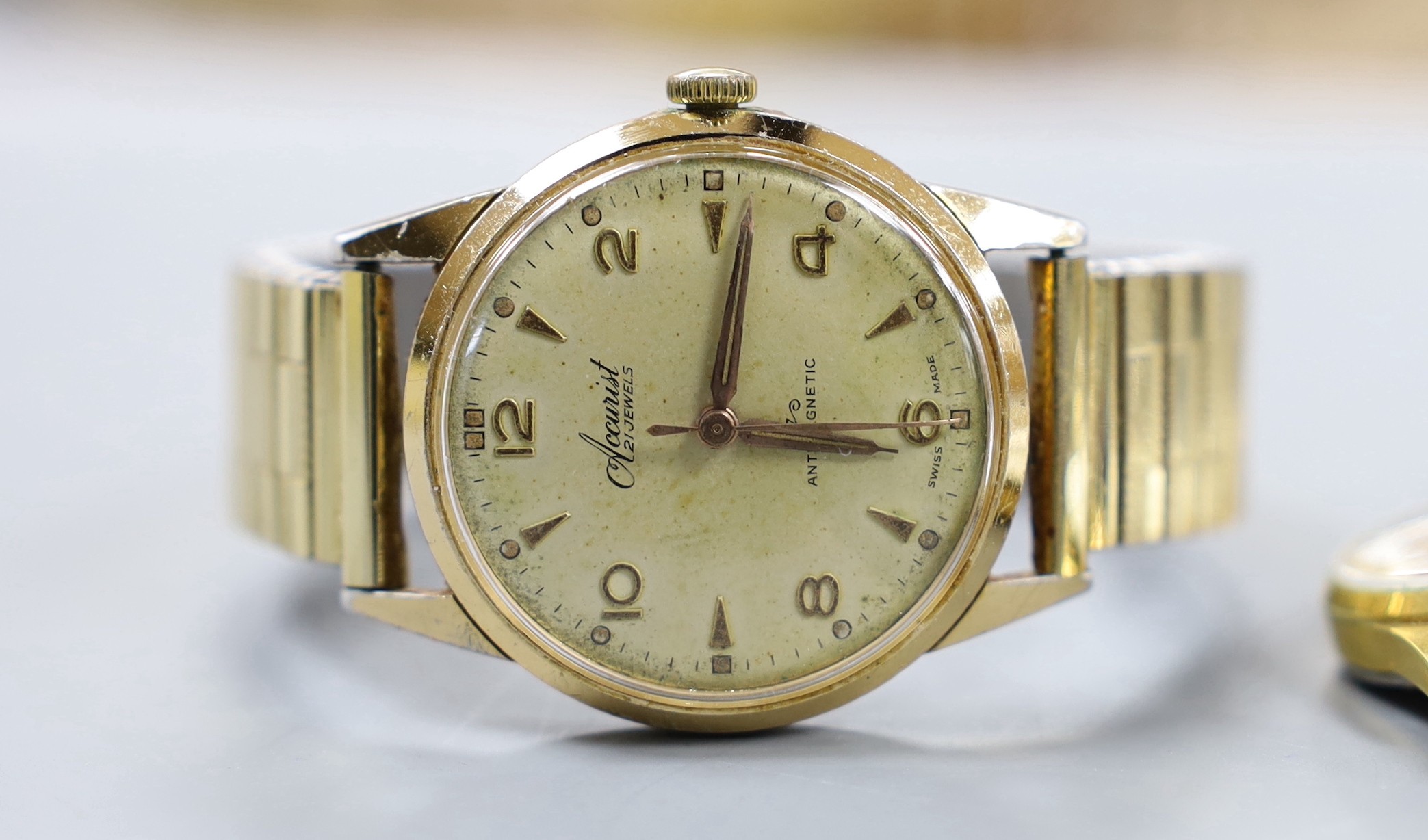 A lady's yellow metal Omega manual wind wrist watch and a group of assorted wrist watch including Lorus, Timex etc.